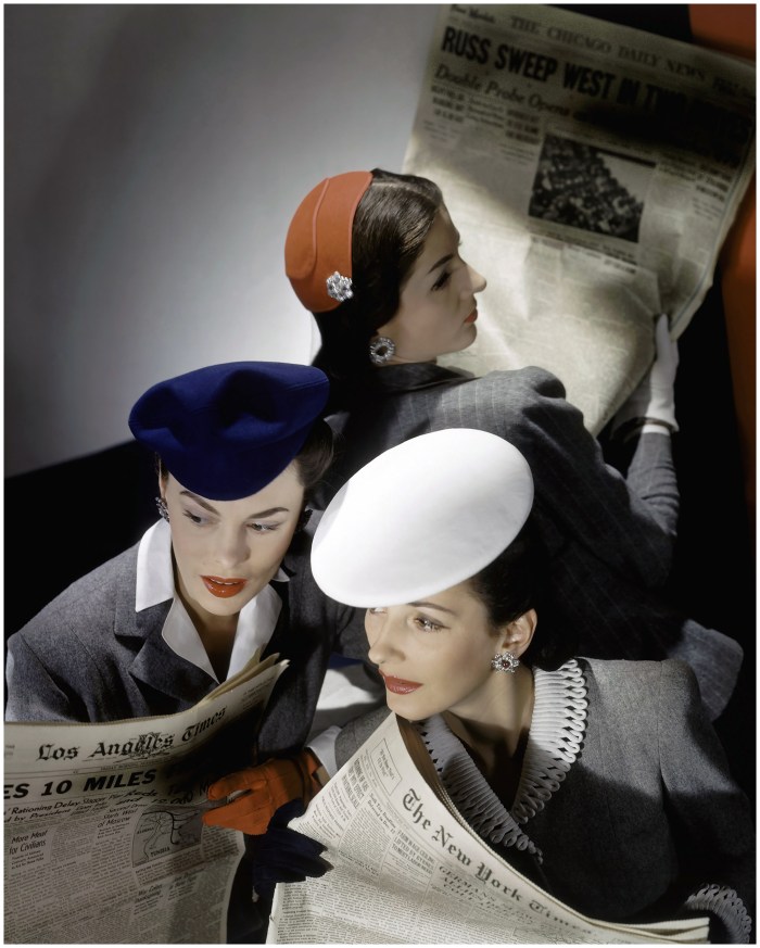 © Hort P. Horst: Models wearing hats and reading newspapers, 1943